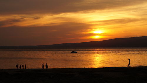 Scenic view of sea at sunset