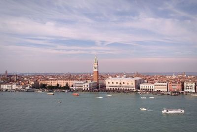 Buildings in venice against cloudy sky