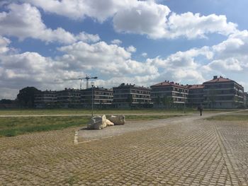 View of built structure against cloudy sky