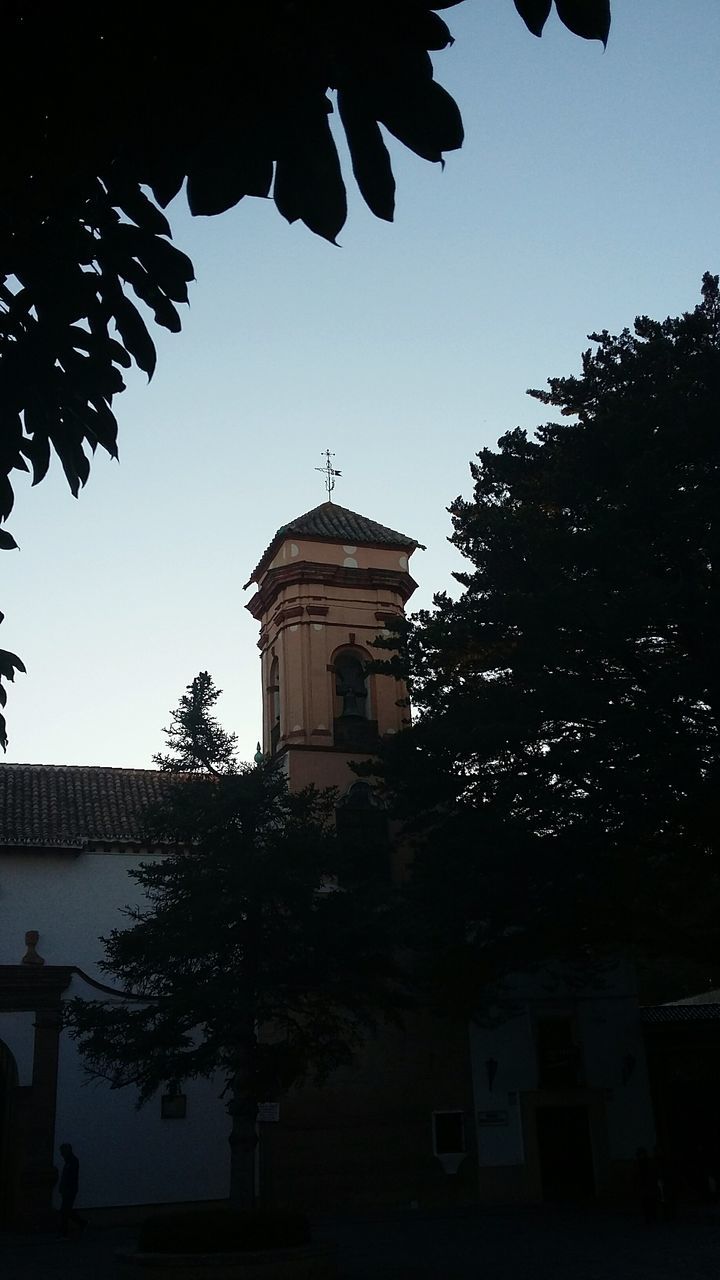 VIEW OF CLOCK TOWER AGAINST CLEAR SKY