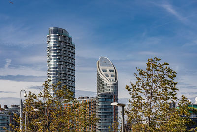 Low angle view of modern buildings against sky