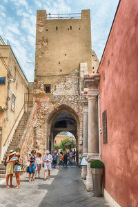 Walking in the picturesque streets of taormina, sicily, italy