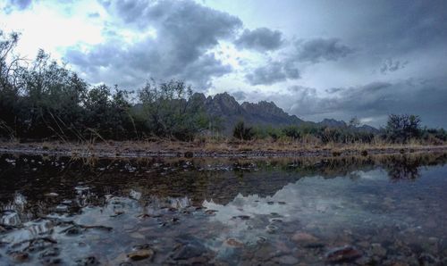 Lakeshore against mountains