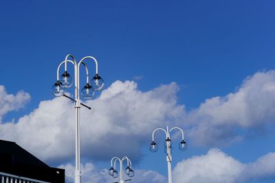 Low angle view of street light against sky