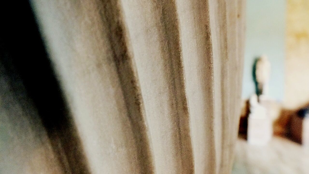 indoors, focus on foreground, close-up, selective focus, textile, pattern, fabric, curtain, part of, in a row, detail, day, no people, hanging, art and craft, textured, design, home interior, cropped