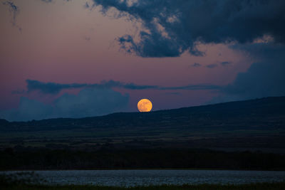 Full moon at dusk
