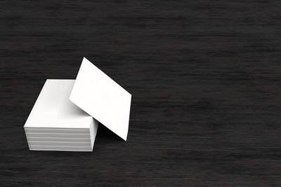 High angle view of white paper on table