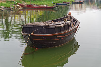 Boat in still river water 