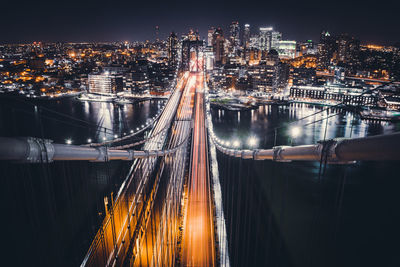 Aerial view of suspension bridge at night