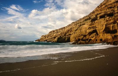 Scenic view of beach against sky