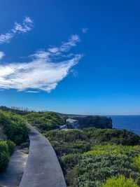 Scenic view of sea against blue sky