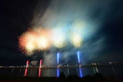 Low angle view of sky illumed with fire crackers