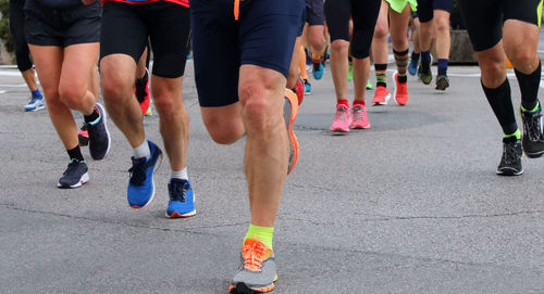 Low section of people running