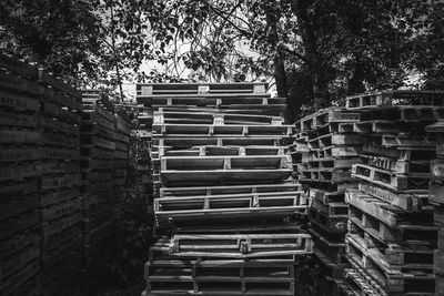 Stack of building against trees in city