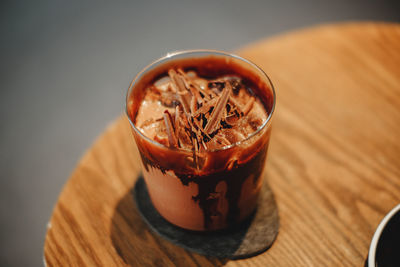 High angle view of drink in glass on table