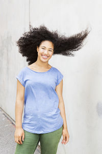 Teenage girl tossing hair, stockholm, sweden