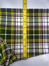 High angle view of measuring tape on shirt