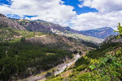 Scenic view of landscape with mountain range in background