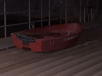Close-up of toy car on table against wall
