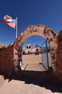 Built structure against clear blue sky