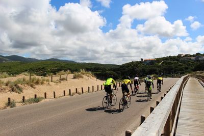 People on road against sky