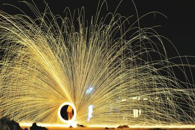 Light painting against sky at night