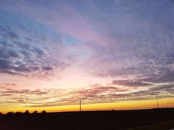Scenic view of dramatic sky during sunset