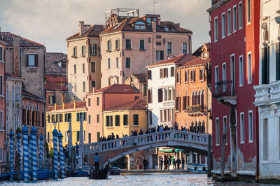 View of buildings against cloudy sky