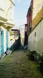 Narrow alley along buildings