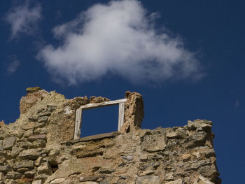 Low angle view of castle against blue sky