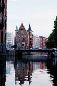 River in city against sky