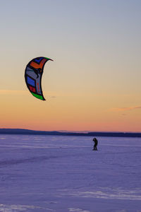 Hot air balloons flying over sea