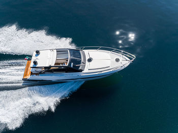 High angle view of ship sailing in sea