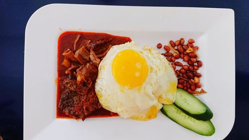 Close-up of breakfast served on plate