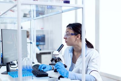 Female doctor working in laboratory