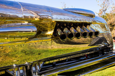 Reflection of field on vintage car