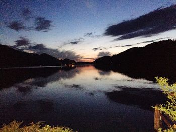 Scenic view of lake at sunset