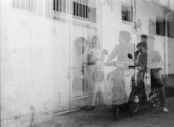 People standing in front of building