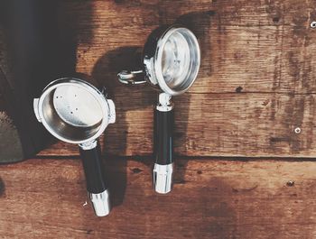 Close-up of electric lamp on table