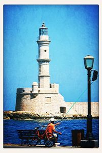 Lighthouse against blue sky