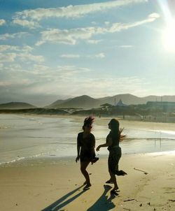 Tourists on mountain at seaside