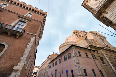 Low angle view of old building against sky