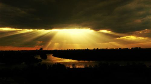 Scenic view of silhouette landscape against sky during sunset