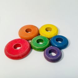 Close-up of multi colored buttons against white background