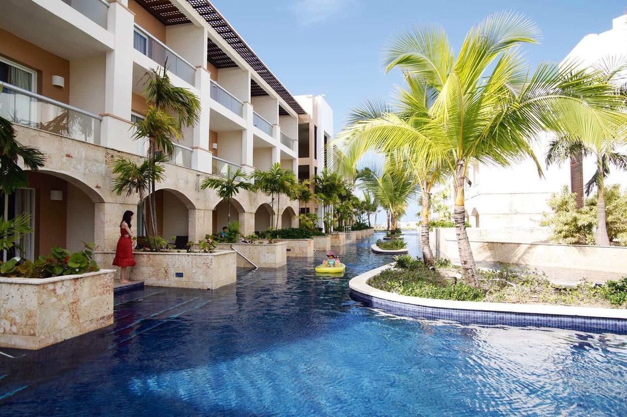 VIEW OF SWIMMING POOL BY HOUSES