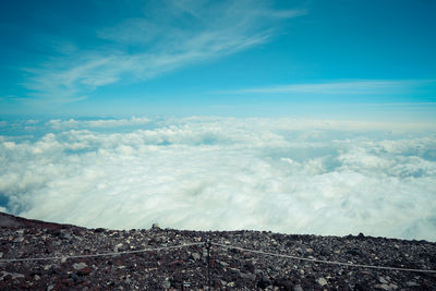 Scenic view of landscape against blue sky