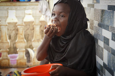 Young woman drinking water