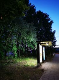 Gazebo in park against sky at night