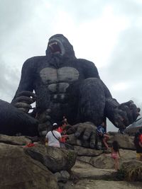 Low angle view of statue against sky