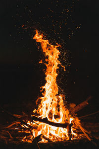 Bonfire on field at night